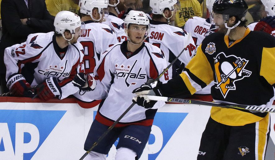 Washington Capitals&#39; Andre Burakovsky (65) celebrates with teammates after his goal during the second period of Game 6 in an NHL Stanley Cup Eastern Conference semifinal hockey game against the Pittsburgh Penguins in Pittsburgh, Monday, May 8, 2017. (AP Photo/Gene J. Puskar)