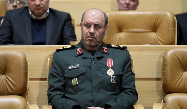 In this Feb. 8, 2016 file photo, Iranian Defense Minister Hossein Dehghan sits after being awarded the &quot;Medal of Courage&quot; by President Hassan Rouhani during a ceremony in Tehran, Iran. Dehghan lashed back on Monday, May 8, 2017, at Saudi Arabia, slamming the kingdoms Deputy Crown Prince Mohammed bin Salman over belligerent comments made last week. (AP Photo/Ebrahim Noroozi, File)