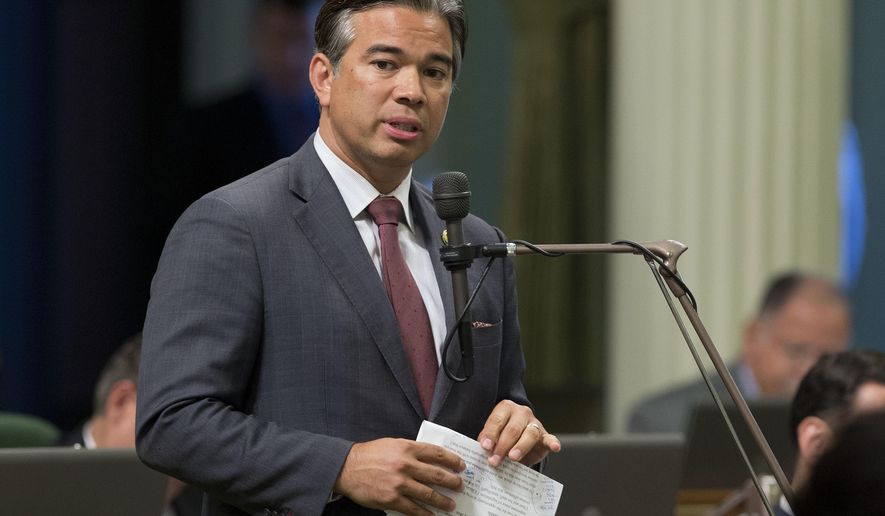 FILE -- In this Aug. 31, 2016 file photo Assemblyman Rob Bonta, D-Alameda, speaks during a legislative session, in Sacramento, Calif. The Assembly approved Bonta's measure, AB22 that would prevent California state employees from being fired for being a member of the Communist Party. The bill now goes to the Senate. (AP Photo/Rich Pedroncelli)