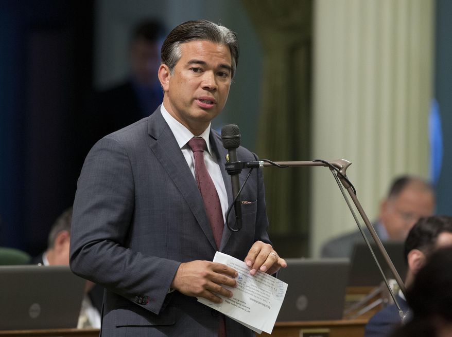 FILE -- In this Aug. 31, 2016 file photo Assemblyman Rob Bonta, D-Alameda, speaks during a legislative session, in Sacramento, Calif. The Assembly approved Bonta's measure, AB22 that would prevent California state employees from being fired for being a member of the Communist Party. The bill now goes to the Senate. (AP Photo/Rich Pedroncelli)