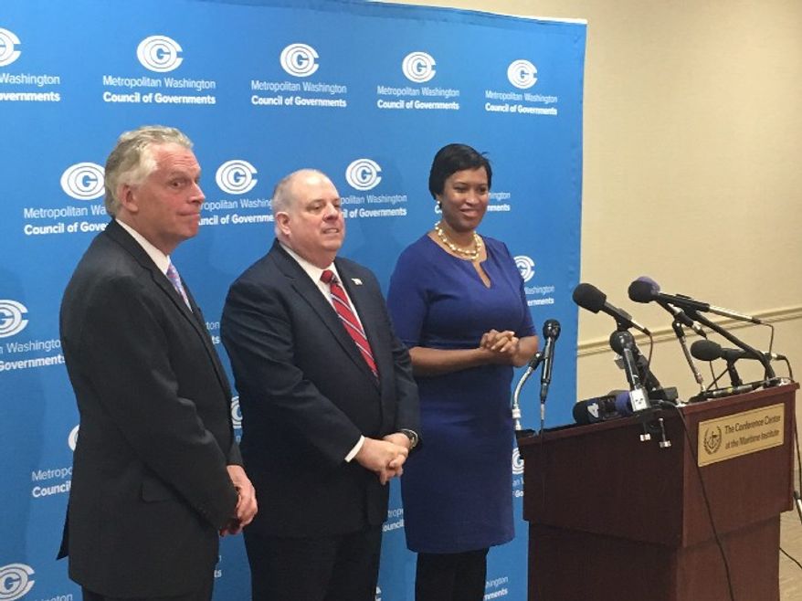 Virginia Gov. Terry McAuliffe (left) joined Maryland Gov. Larry Hogan and D.C. Mayor Muriel Bowser at the Regional Opioid and Substance Abuse Summit. He called for more drug courts that can get addicts into treatment programs rather than throwing them into prisons. (Ryan M. McDermott/The Washington Times)