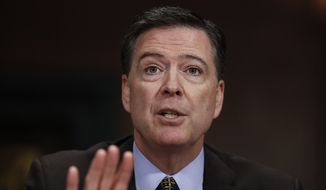 In this Wednesday, May 3, 2017, file photo, then-FBI Director James Comey testifies on Capitol Hill in Washington, before a Senate Judiciary Committee hearing. President Donald Trump abruptly fired Comey on May 9, ousting the nation&#39;s top law enforcement official in the midst of an investigation into whether Trump&#39;s campaign had ties to Russia&#39;s election meddling.(AP Photo/Carolyn Kaster) ** FILE **