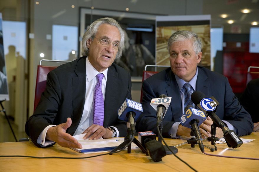 FILE – In this June 2, 2016, file photo, attorneys Thomas Kline, left, and Robert Mongeluzzi, right, take part in a news conference in Philadelphia. Amtrak engineer Brandon Bostian won&#39;t be charged in the May 12, 2015, Amtrak passenger train derailment in Philadelphia that killed eight people and injured about 200 others, according to Kline and Mongeluzzi, who represent victims of the crash. KYW-AM first reported Tuesday, May 9, 2017, that the lawyers say Bostian won&#39;t be charged. (AP Photo/Matt Rourke, File)