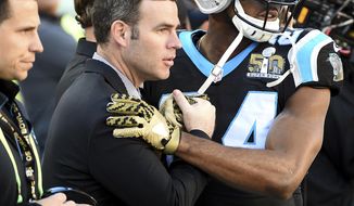This Feb. 7, 2016 photo shows Carolina Panthers assistant general manager Brandon Beane, left, and cornerback Josh Norman, right, greeting one another prior to action vs the Denver Broncos at Levi&#39;s Stadium in Santa Clara, Calif. The Buffalo Bills hired Beane to fill their general manager vacancy in yet another indication of rookie head coach Sean McDermott&#39;s growing influence over team decisions. The Bills announced the move on Tuesday, May 9, 2017. (Jeff Siner/The Charlotte Observer via AP)