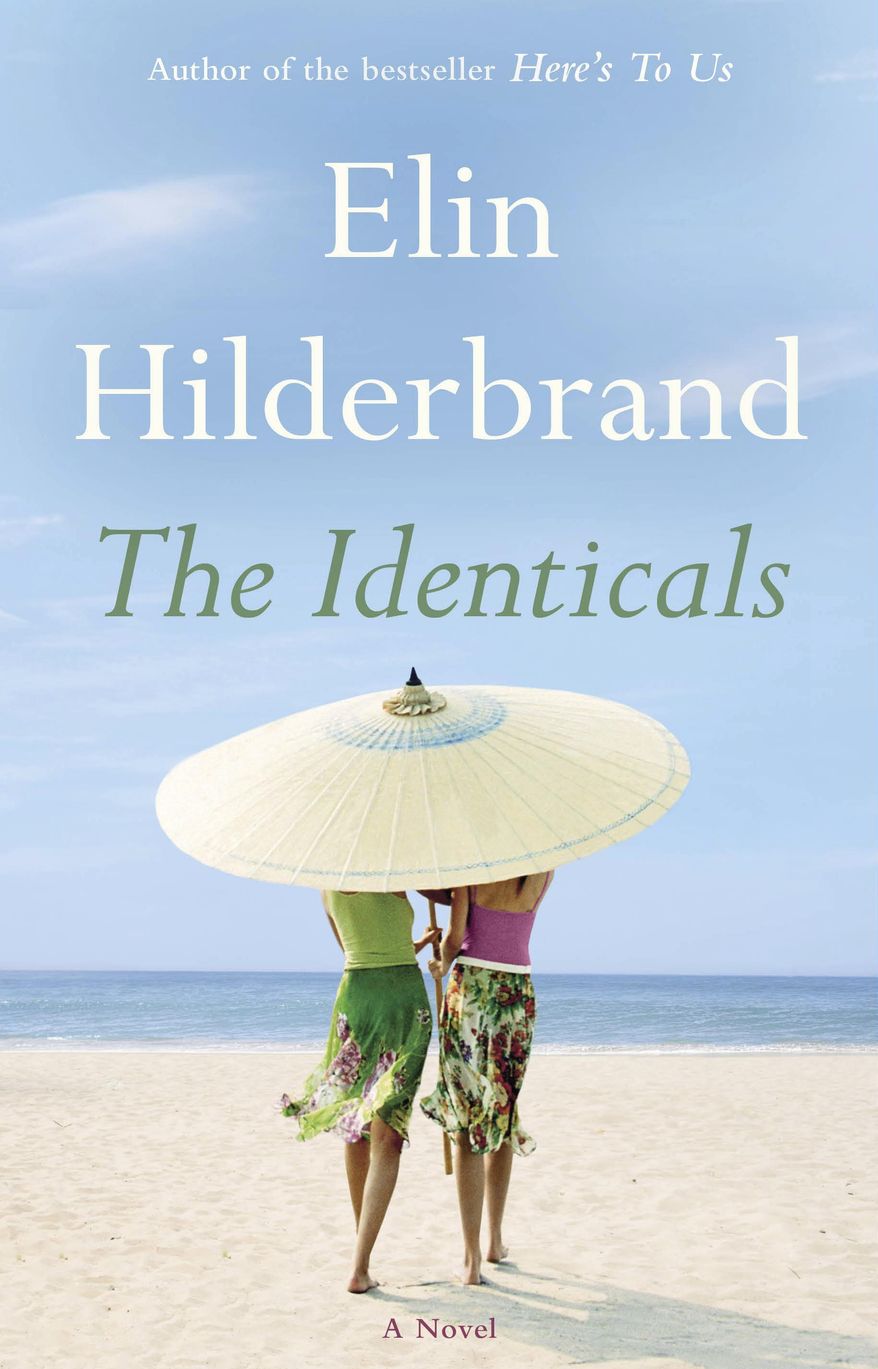 This cover image released by Little, Brown and Company shows "The Identicals," by Elin Hilderbrand, available on June 13. (Little, Brown and Company via AP)