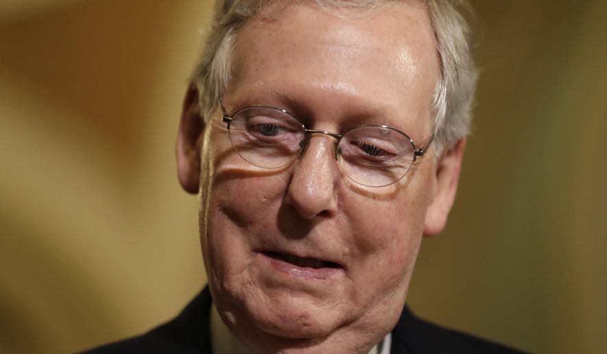 Senate Majority Leader Mitch McConnell, Kentucky Republican, pauses while meeting with the media to discuss health care on Capitol Hill in Washington on May 9, 2017. (Associated Press) **FILE**