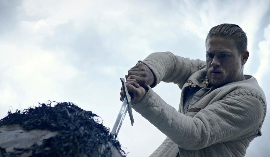 This image released by Warner Bros. Pictures shows Charlie Hunnam in a scene from, &amp;quot;King Arthur: Legend of the Sword.&amp;quot; (Warner Bros. Pictures via AP)