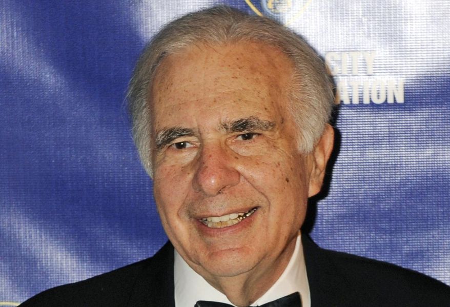 In this March 16, 2010, file photo, financier Carl Icahn poses for photos upon arriving for the annual New York City Police Foundation Gala in New York. (AP Photo/Henny Ray Abrams, File)