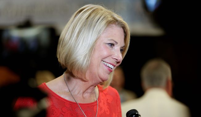 Omaha Mayor Jean Stothert, a Republican, celebrated her defeat over challenger Heath Mello. The Nebraska race has drawn national attention as Democrats seek new energy given huge Republican gains in local, state and federal offices across the country. (Associated Press)