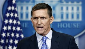 FILE- In this Feb. 1, 2017, file photo, then-National Security Adviser Michael Flynn speaks during the daily news briefing at the White House, in Washington. Flynn resigned as President Donald Trump&#39;s national security adviser on Feb. 13, 2017. (AP Photo/Carolyn Kaster, File)