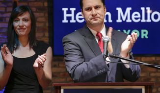 With wife Catherine by his side, Democratic mayoral candidate Heath Mello concedes the election to the incumbent, Republican Omaha mayor Jean Stothert, in Omaha, Neb., Tuesday, May 9, 2017. The race has drawn national attention as Democrats seek new energy given huge Republican gains in local, state and federal offices across the country. (AP Photo/Nati Harnik)