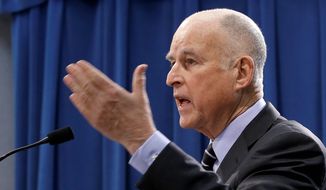 California Gov. Jerry Brown, a Democrat who signed Senate Bill 1 two weeks ago, said last month that “Safe and smooth roads make California a better place to live and strengthen our economy. This legislation will put thousands of people to work.” (Associated Press/File)