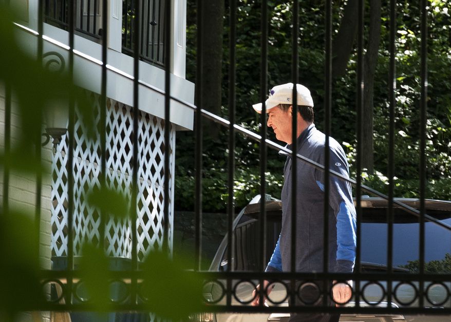 Former FBI Director James Comey walks at his home in McLean, Va., Wednesday, May 10, 2017. President Donald Trump fired Comey on Tuesday, ousting the nation&#39;s top law enforcement official in the midst of an investigation into whether Trump&#39;s campaign had ties to Russia&#39;s election meddling. (AP Photo/Sait Serkan Gurbuz)