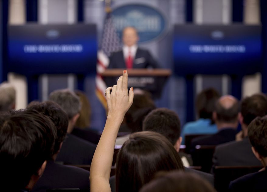 A reporters raises their hand as White House press secretary Sean Spicer talks to the media during the daily press briefing at the White House in Washington, Wednesday, May 3, 2017. Spicer discussed health care and FBI Director James Comey, comments made by Hillary Clinton and other topics. (AP Photo/Andrew Harnik)