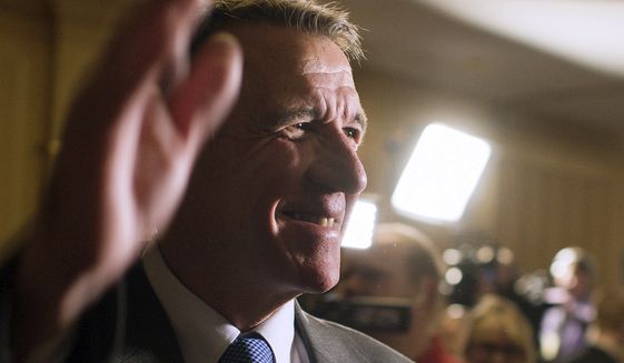 In this Nov. 8, 2016 file photo, Republican gubernatorial candidate Phil Scott waves to a room full of supporters as he awaits the election results at the Sheraton Burlington Hotel in South Burlington, Vt. The future of legalized recreational marijuana use in Vermont hinged Thursday, May 11, 2017, on a decision by Scott a day after the state Legislature became the first in the country to vote to legalize it. (AP Photo/Andy Duback, File)