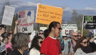 A few hundred people chanted slogans and made speeches to protest the presence of U.S. Secretary of State Rex Tillerson in Fairbanks, Alaska, on Wednesday, May 10, 2017. High-level officials from the world&#39;s eight Arctic nations, including Tillerson, will meet in Alaska amid concerns about the future of the sensitive region after President Trump called for more oil drilling and development. (AP Photo/Mark Thiessen)