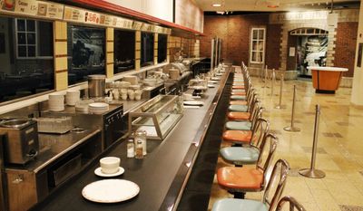 This Sept. 16, 2016 photo shows the F.W. Woolworth&#x27;s lunch counter at the International Civil Rights Center &amp;amp; Museum in Greensboro, N.C. Duke Energy could cut power to the museum in a dispute over an $18,000 credit deposit. (AP Photo/Skip Foreman)