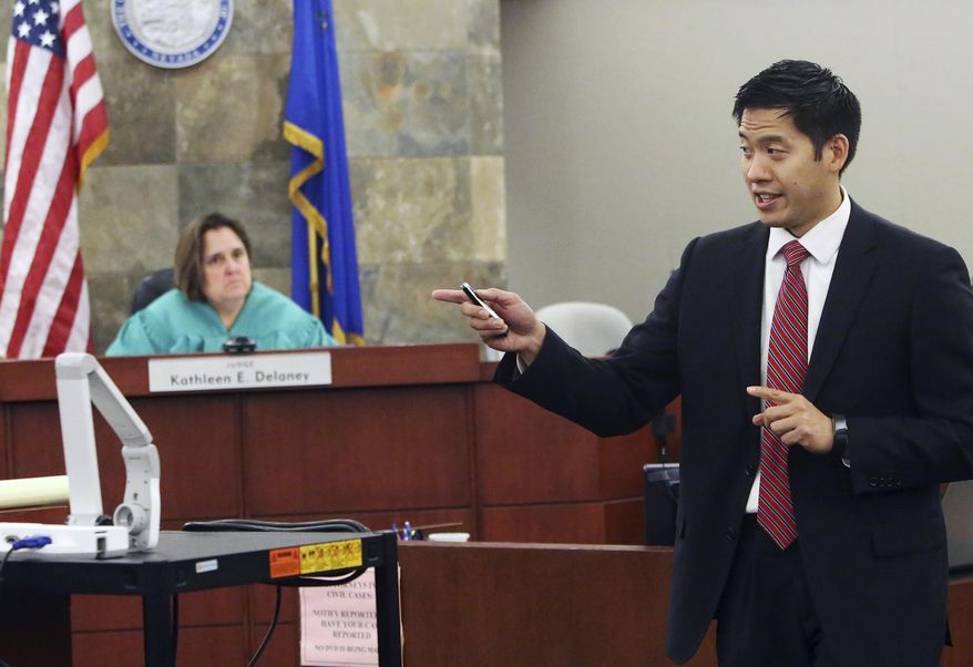Prosecutor Alexander Chen delivers his opening statement to the jury in the trial of Binh Minh "Ben" Chung, suspended physician accused of drugging patients and videotaping himself having sex with them, at the Regional Justice Center on Thursday, May 11, 2017, in Las Vegas. (Bizuayehu Tesfaye/Las Vegas Review-Journal via AP)