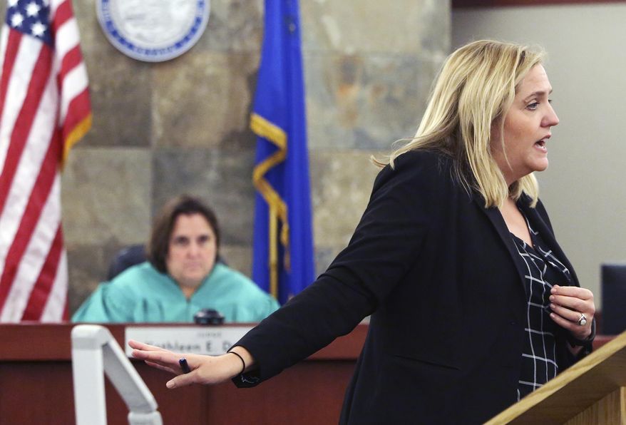 Defense attorney Betsy Allen delivers her opening statement to the jury as Judge Kathleen Delaney looks on during the trial of Binh Minh "Ben" Chung, suspended physician accused of drugging patients and videotaping himself having sex with them, at the Regional Justice Center on Thursday, May 11, 2017, in Las Vegas. (Bizuayehu Tesfaye/Las Vegas Review-Journal via AP)