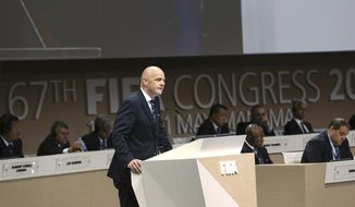 FIFA President Gianni Infantino, left, speaks during the FIFA Congress, in Manama, Bahrain, Thursday, May 11 2017. Addressing his second congress of soccer nations as FIFA president, Infantino lambasted &amp;quot;fake news&amp;quot; following criticism of his leadership. Infantino didn&#39;t cite any reports but it comes in the week ethics judge Hans-Joachim Eckert and FIFA prosecutor Cornel Borbely denounced the decision to remove them from their posts. (AP Photo)