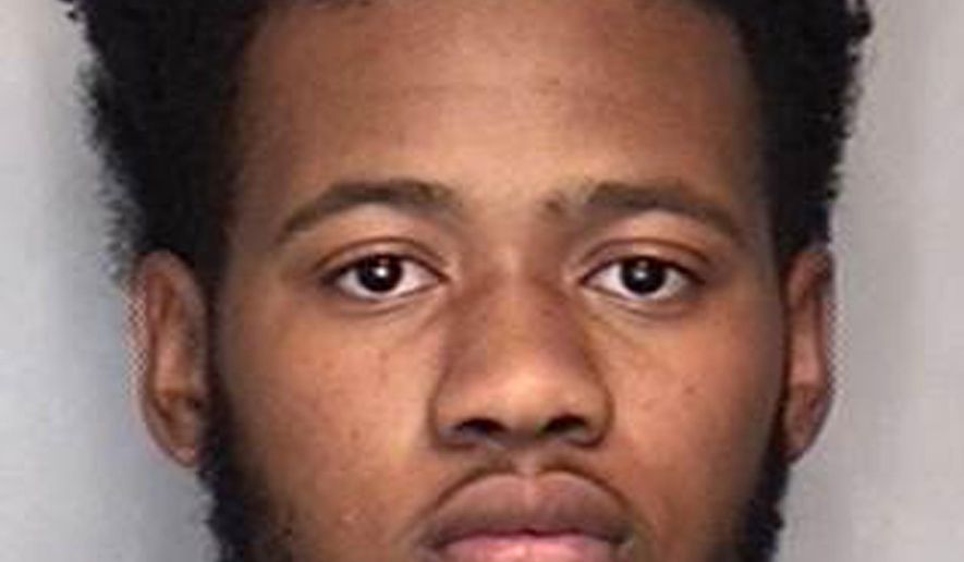 This undated photo provided by the Champaign County Sheriff's Office shows Zarrian J.Holcombe. Holcombe and two other University of Illinois football players are charged with burglary and robbery after what they claimed to be a prank on a fellow dormitory resident. The players were charged Thursday, May 11, 2017, and were to be arraigned later in the day with residential burglary and aggravated robbery. (Champaign County Sheriff's Office via AP)