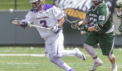 In this May 6, 2017 photo provided by University of Albany, University of Albany&#x27;s TD Ierlan (3), fields the ball while begin pursued by University of Binghamton&#x27;s Austin Macchi (22) during the America East Conference Championship in Albany, N.Y. Freshman TD Ierlan could help the team progress past the second weekend of the NCAA Tournament, something they have yet to accomplish. (Bill Ziskin/University of Albany via AP)