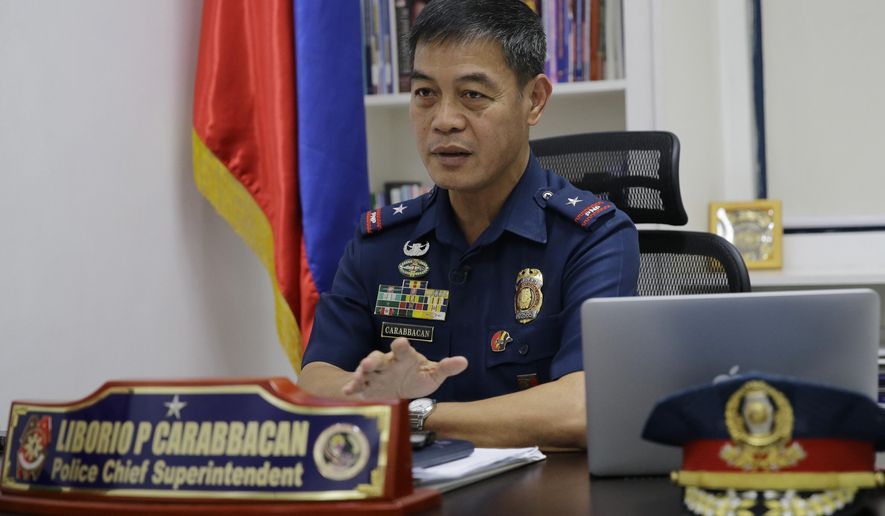 In this April 21, 2017 photo, Gen. Liborio Carabbacan of the National Police Women and Children Protection Center gestures during an interview in metropolitan Manila, Philippines. Authorities in the Philippines have arrested 3 women who were livestreaming sexually exploitative videos of girls to men paying by the minute to watch from half a world away. Carabbacan said the incidents are increasing in the Philippines because many people are gaining access to the internet and English fluency is common, making it possible to communicate with would-be customers. (AP Photo/Aaron Favila)