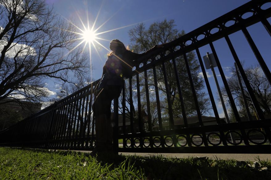 ADVANCE FOR USE MONDAY, MAY 15, 2017 AND THEREAFTER-Itza Ayala poses for a photo at a park in Houston on Wednesday, Feb. 15, 2017. When school administrators didn't investigate her 15-year-old daughter's alleged sexual assault by another student, she says, her family turned to the U.S. Education Department's Office for Civil Rights. The office has struggled to keep up with an increase in complaints against school districts. (AP Photo/Eric Gay)