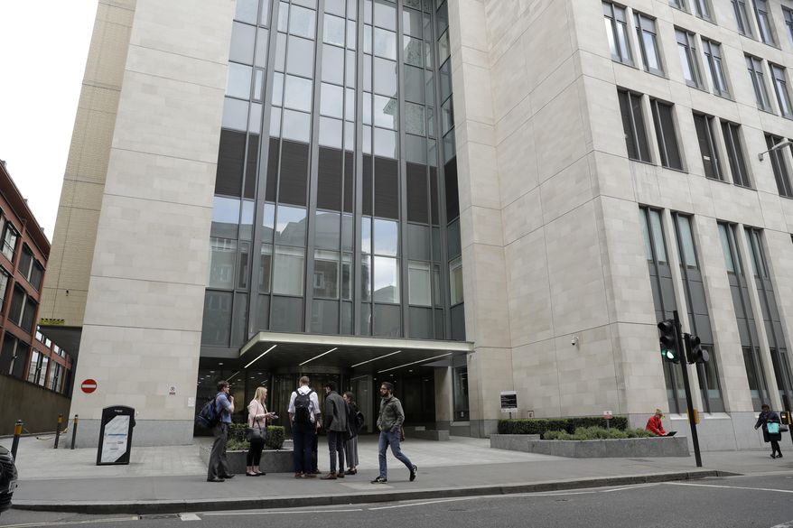 An exterior view shows the main entrance of St Bartholomew's Hospital, in London, one of the hospitals whose computer systems were affected by a cyberattack, Friday, May 12, 2017. A large cyberattack crippled computer systems at hospitals across England on Friday, with appointments canceled, phone lines down and patients turned away. (AP Photo/Matt Dunham)