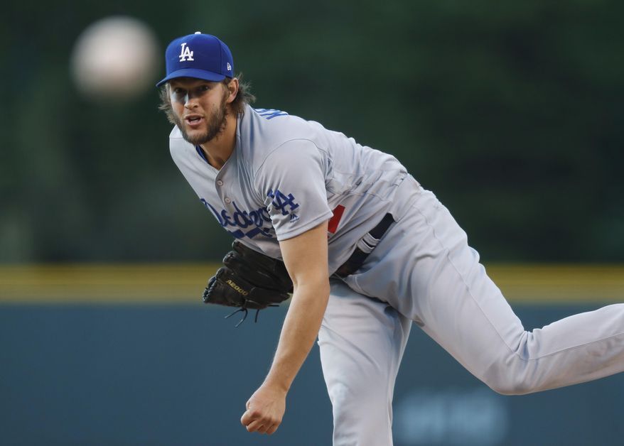 Los Angeles Dodgers starting pitcher Clayton Kershaw throws to a Colorado Rockies batter during the first inning of a baseball game Friday, May 12, 2017, in Denver. (AP Photo/David Zalubowski)