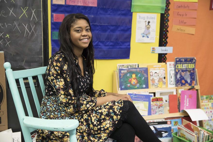 ADVANCE FOR WEEKEND EDITIONS - in this Thursday, April 20, 2017, photo, Heights Murray Elementary School teacher Mary Tranguch poses for a photo at the school in Wilkes-Barre, Pa. Tranguch, a second grade teacher, knows first hand how minority students can benefit from having minority teachers. (Christopher Dolan/The Citizens' Voice via AP)
