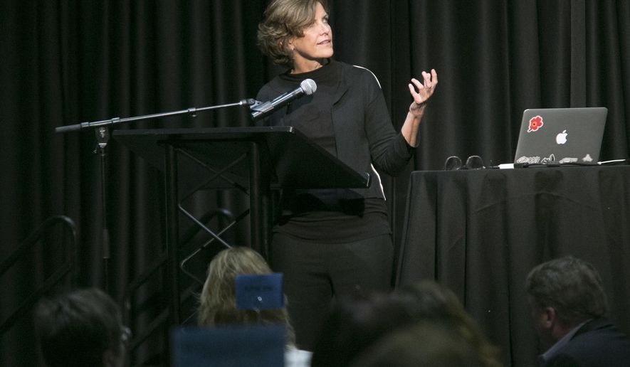 In this April 18, 2017 photo architect and Belvidere, Ill., native, Jeanne Gang talks about projects her team is working on in Chicago while speaking during a luncheon, at Giovanni's Restaurant & Convention Center in Rockford, Ill. The 1982 Belvidere High School graduate, among the world's most esteemed architects, came home today to discuss her art with a crowd of more than 300 people. (Arturo Pernandez/Rockford Register Star via AP)