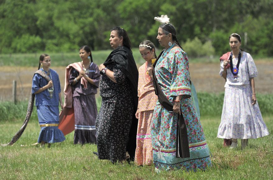 Casey Camp-Horinek leads a group of native dancers during a ceremony Thursday, May 11, 2017 in which the Nebraska Trails Foundation formally turned over nearly 20 miles of recreational trail between Beatrice and the Kansas State Line to the Ponca Tribe of Nebraska. The section will now be called the Chief Standing Bear Trail. (Eric Gregory/The Journal-Star via AP)
