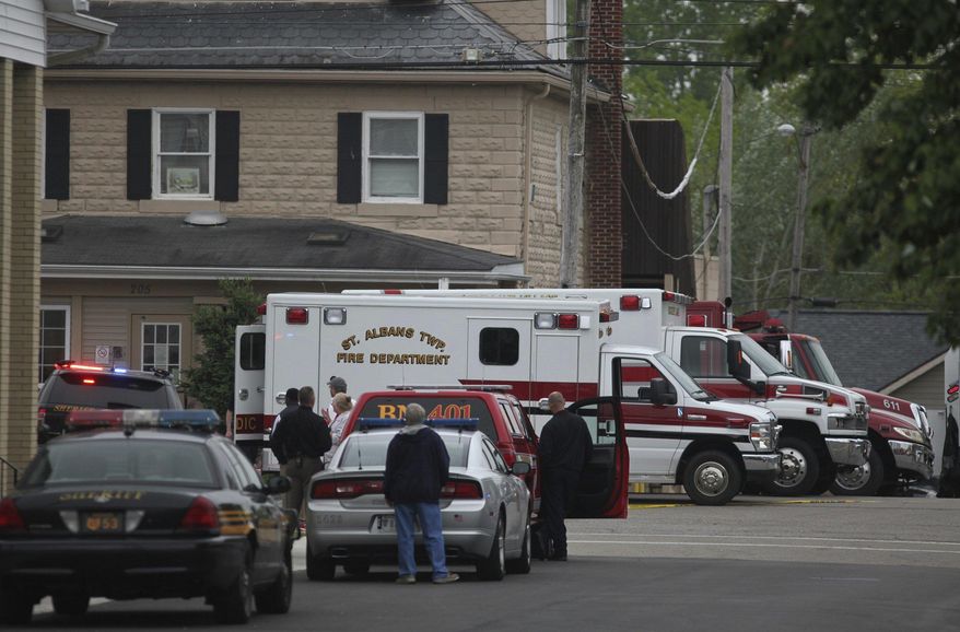 Emergency personnel arrive to the scene of a shooting outside Pine Kirk nursing home in Kirkersville, Ohio on Friday, May 12, 2017. Authorities say Steven Eric Disario, who headed the Kirkersville Police Department, and two nursing home employees have been killed by a gunman who was later found dead inside the care facility. (Doral Chenoweth III/The Columbus Dispatch via AP)