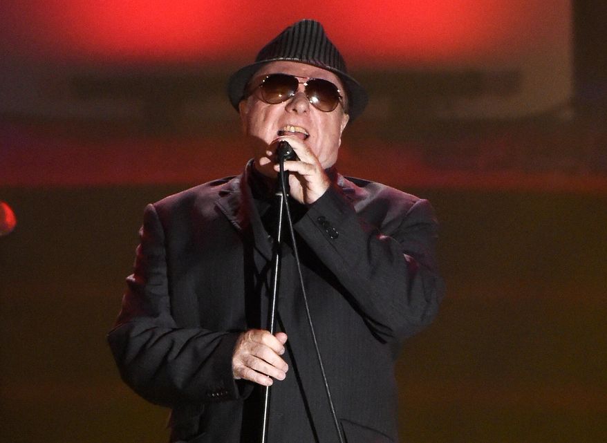 In this June 18, 2015, file photo, Van Morrison performs at the 46th Annual Songwriters Hall of Fame Induction and Awards Gala in New York. (Photo by Evan Agostini/Invision/AP, File)