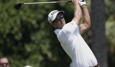 Adam Scott, of Australia, hits from the second tee during the first round of The Players Championship golf tournament Thursday, May 11, 2017, in Ponte Vedra Beach, Fla. (AP Photo/Lynne Sladky)