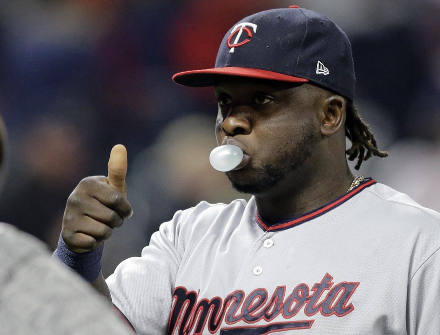 Minnesota Twins' Miguel Sano gives a thumbs-up after the Twins defeated the Cleveland Indians 1-0 in a baseball game, Friday, May 12, 2017, in Cleveland. (AP Photo/Tony Dejak)