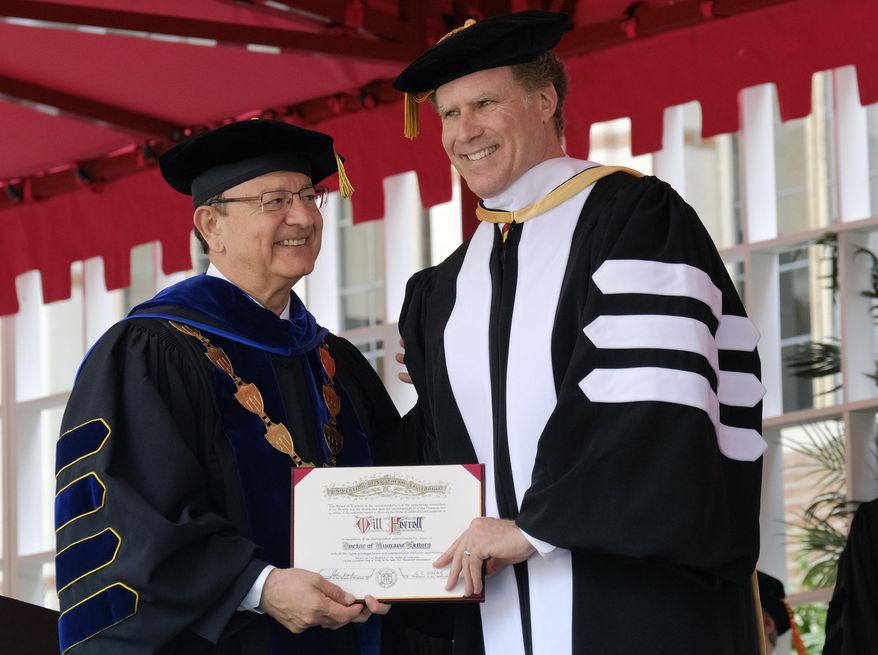 President of the University of Southern California C.L. Max Nikias, left, presents actor Will Ferrell with an honorary doctorate degree during USC's 134th commencement ceremony in Los Angeles on Friday, May 12, 2017. (AP Photo/Richard Vogel)