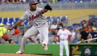 Atlanta Braves&#39; Julio Teheran delivers a pitch during the first inning of a baseball game against the Miami Marlins, Saturday, May 13, 2017, in Miami. (AP Photo/Wilfredo Lee)