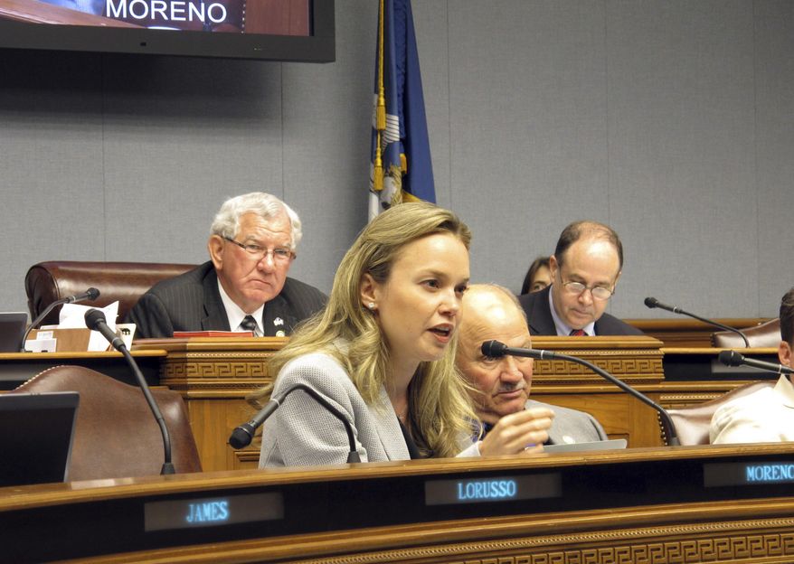 FILE - In this April 14, 2015 file photo, Rep. Helena Moreno, D-New Orleans, asks questions in the House Appropriations Committee in Baton Rouge, La. Moreno spent years working on a series of bills that eventually resulted in getting naloxone, the opiate antidote, available as an over-the-counter drug. Now, she’s focused on preventing people from getting addicted to painkillers such as Vicodin and OxyContin in the first place. (AP Photo/Melinda Deslatte)
