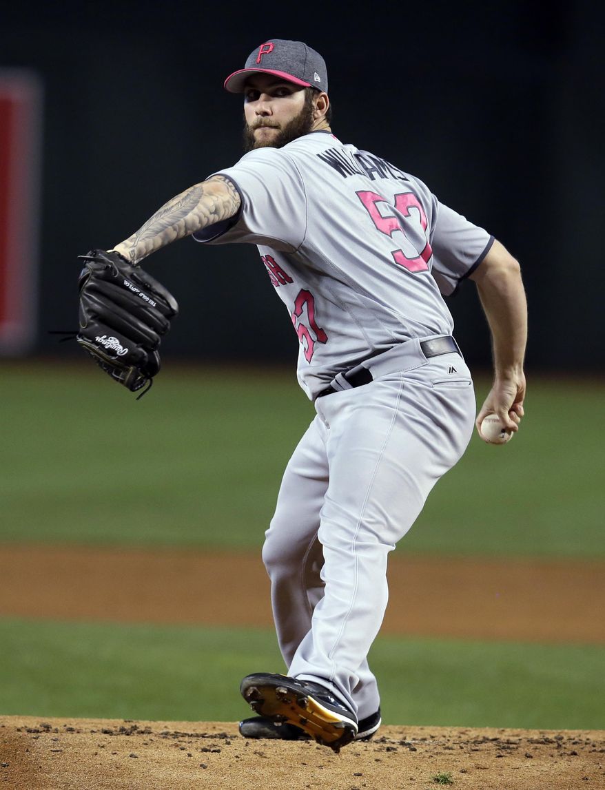 Pittsburgh Pirates pitcher Trevor Williams winds up during the first inning of the team's baseball game against the Arizona Diamondbacks, Saturday, May 13, 2017, in Phoenix. (AP Photo/Rick Scuteri)