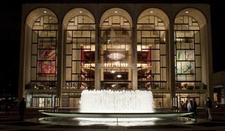 This 2009 image released by the Metropolitan Opera shows The Metropolitan Opera House at Lincoln Center Plaza in New York. The financially troubled Metropolitan Opera says it projects to break even for the 2016-17 season. Met general manager Peter Gelb said Monday the company’s attendance was up 3 percent this year overall and 1 percent in potential box office realized. (Jonathan Tichler/Metropolitan Opera via AP)
