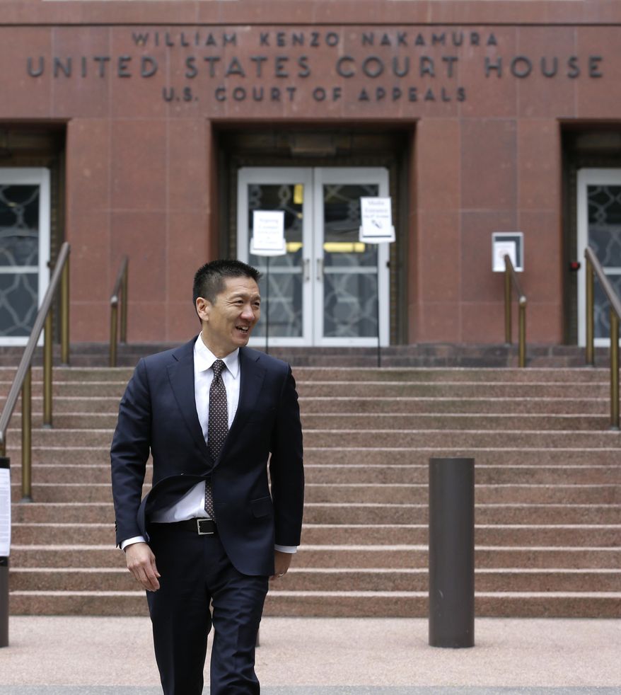 Hawaii Attorney General Doug Chin arrives to talk to reporters Monday, May 15, 2017, outside a federal courthouse in Seattle. A three-judge panel of the 9th U.S. Circuit Court of Appeals heard arguments Monday in Seattle over Hawaii&#39;s lawsuit challenging President Donald Trump&#39;s revised travel ban, which would suspend the nation&#39;s refugee program and temporarily bar new visas for citizens of Iran, Libya, Somalia, Sudan, Syria and Yemen. (AP Photo/Ted S. Warren)