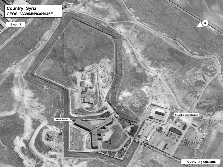 This image provided by the State Department and DigitalGlobe, taken April 18, 2017, a satellite image of what the State Department described as a building in a prison complex in Syria that was modified to support a crematorium. The Trump administration accused the Syrian government of carrying out mass killings of thousands of prisoners and burning the dead bodies in a large crematorium outside the capital. It also stepped up criticism of Iran and Russia for supporting the Syrian government. (State Department/DigitalGlobe via AP)