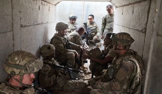There are an estimated 7,000 overall U.S. military personnel in Iraq, including several hundred Special Forces fighters advising the Iraqi army in the siege of Mosul. (Associated Press)