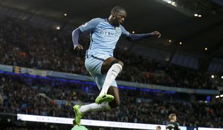 Manchester City&#x27;s Yaya Toure celebrates scoring against West Bromwich Albion during the English Premier League soccer match at the Etihad Stadium, Manchester, England, Tuesday May 16, 2017. (Martin Rickett/PA via AP)