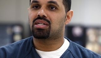 FILE - In this May 7, 2014 file photo, Rene Lima-Marin sits for an interview with The Associated Press about the circumstances of his sentencing and incarceration, in a meeting room inside Kit Carson Correctional Center, a privately operated prison in Burlington, Colo. Lima-Marin was sent back to prison after being mistakenly released 90 years early. On Tuesday May 16, 2017, a judge ordered him released from prison again, saying it would be &amp;quot;draconian&amp;quot; to keep him behind bars and that he has paid his debt to society. (AP Photo/Brennan Linsley, File)