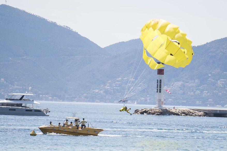Actor T. J. Miller parasails upon arrival to the photo call for the film The Emoji Movie, at the 70th international film festival, Cannes, southern France, Tuesday, May 16, 2017. (Photo by Arthur Mola/Invision/AP)