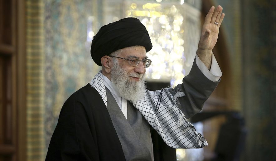 In this March 21, 2017 file photo, released by an official website of the office of the Iranian supreme leader, Supreme Leader Ayatollah Ali Khamenei waves to a crowd in a trip to the northeastern city of Mashhad, Iran. (Office of the Iranian Supreme Leader via AP, File)