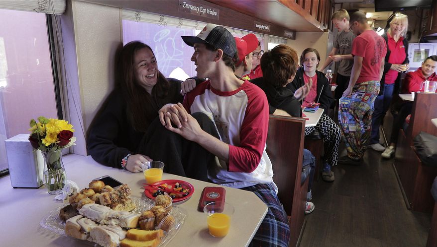 Beth Walters, left, and Stephen Craig, both clowns with Ringling Bros. and Barnum & Bailey Circus talk during the clowns' final group breakfast, Thursday, May 4, 2017, in Providence, R.I. "The Greatest Show on Earth" is about to put on its last show on earth. For the performers who travel with the Ringling Bros. and Barnum & Bailey Circus, its demise means the end of a unique way of life for hundreds of performers and crew members. (AP Photo/Julie Jacobson)